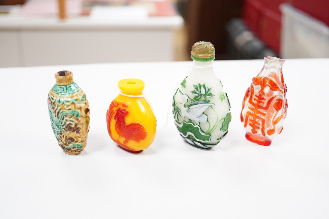 Three Chinese glass snuff bottles and a porcelain snuff bottle(4), tallest 8cm high